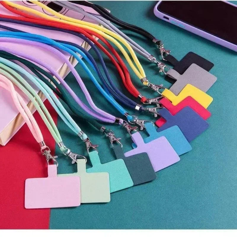 Colorful lanyards with badge holders on a multicolored background