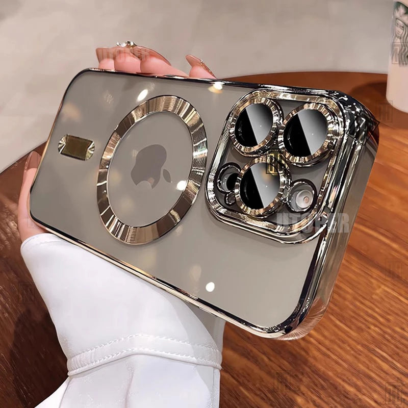 Silver phone case with reflective surface held by a person on a wooden surface