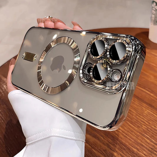 Silver phone case with reflective surface held by a person on a wooden surface