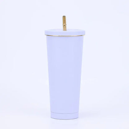 Light purple tumbler with a gold lid on a white background