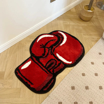 Red boxing glove rug on a wooden floor