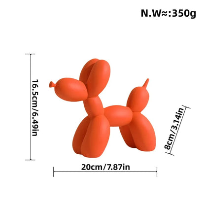 Orange balloon dog sculpture with measurements on a white background