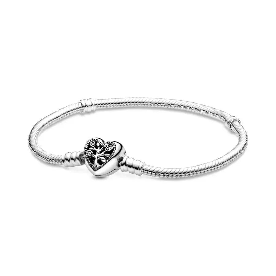 Silver bracelet with a heart-shaped charm on a white background