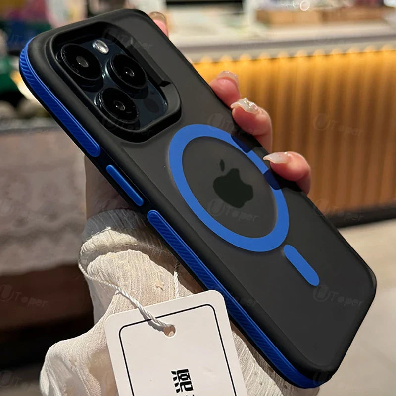 Phone case with blue accents held by a person, blurred background