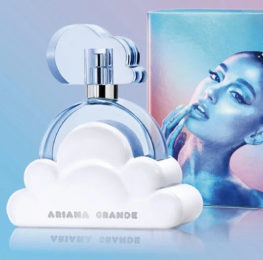 Perfume bottle with cloud design and Ariana Grande's face on packaging