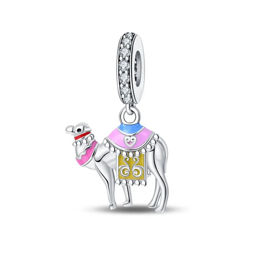 Silver camel charm with colorful details on a white background