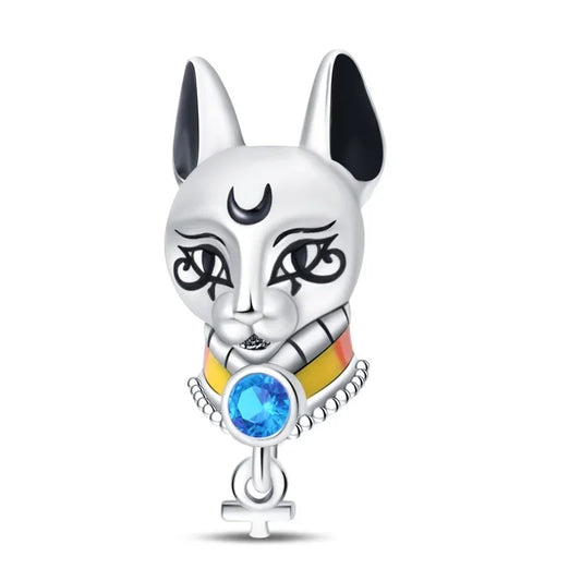 Silver cat-shaped charm with colorful collar and blue gem on a white background