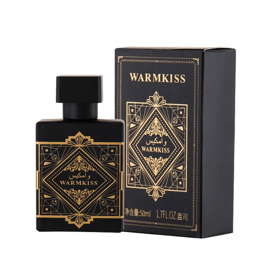 Black and gold perfume bottle and packaging with 'WARMKISS' branding on a white background