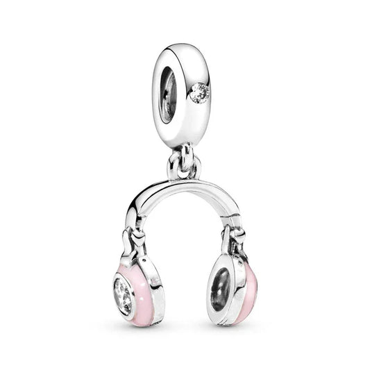 Headphones Silver charm with pink accents on a white background
