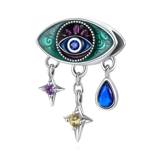 evil eye Jewelry charm with eye design and colorful stones on a white background