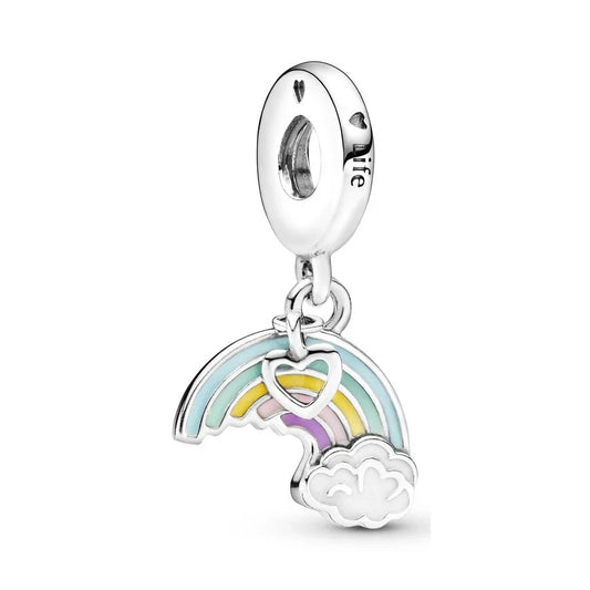 Silver charm with rainbow and cloud design on a white background