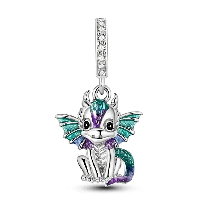 Dragon-shaped pendant with colorful wings and a white background