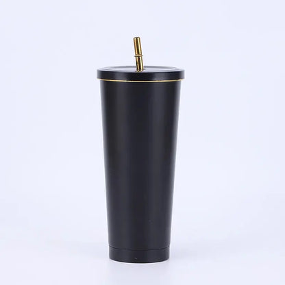 Black tumbler with a gold lid on a white background