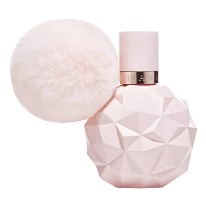 Adrian Grande Pink perfume bottle with geometric design and matching fluffy applicator on a white background
