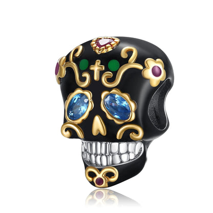 Decorative skull charm with gemstones on a white background. pandora style charm pendant. Gothic style, halloween theme