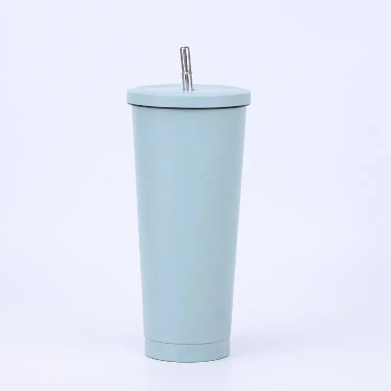 Light blue tumbler with a straw on a white background