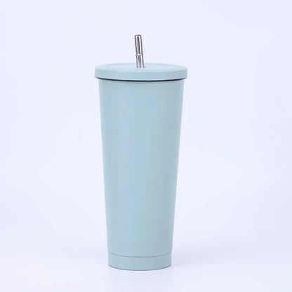 Light blue tumbler with a straw on a white background