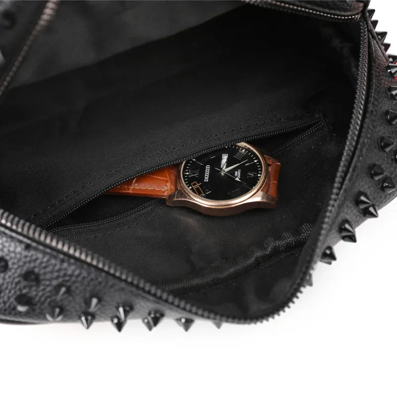 Black studded bag with a watch inside on a white background