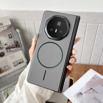 Person holding a modern phone case with a blurred indoor background