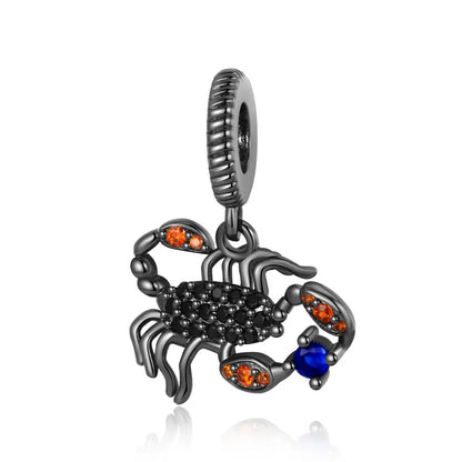 Scorpion-shaped charm with colored stones on a white background. pandora style charm pendant. Gothic style, halloween theme 