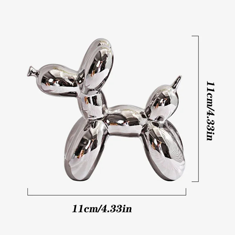 Silver balloon dog sculpture with dimensions on a white background