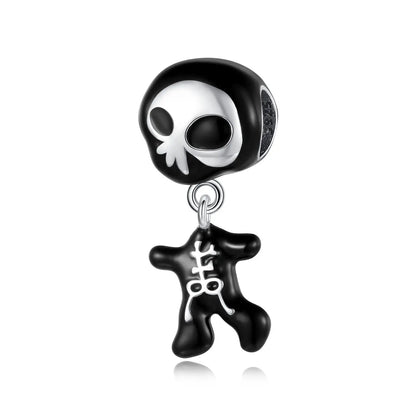 Black and white skull-shaped charm on a white background. pandora style charm pendant. Halloween, gothic. skull and bones 