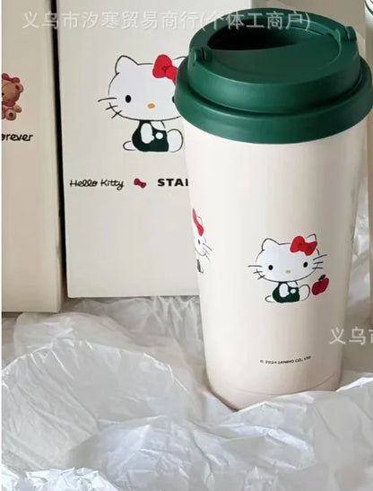 Hello Kitty Hello Kitty tumbler with green lid on a white surface