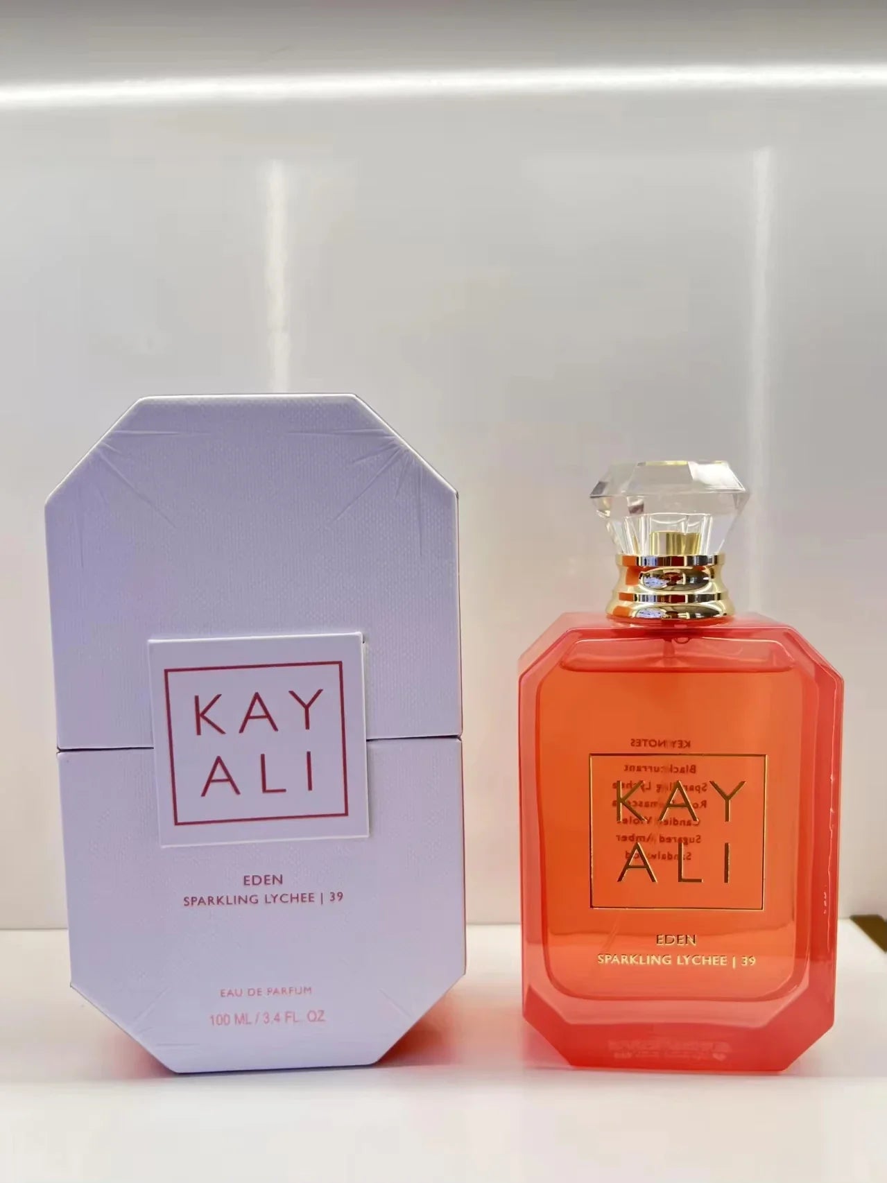 Kay Ali perfume bottle and packaging on a white background