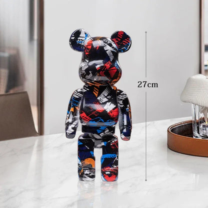 Colorful bear-shaped figurine on a white surface with a measurement label indicating its height. be@rbrick collectable be@rbrick collectable