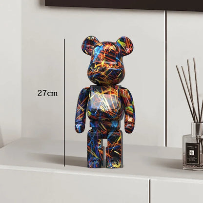 Colorful bear-shaped figure on a white surface with measurement be@rbrick collectable