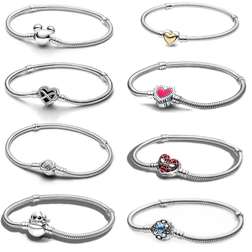 Disney Collection of silver bracelets with various charms on a white background