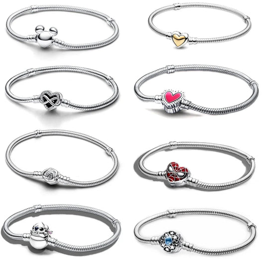 Disney Collection of silver bracelets with various charms on a white background
