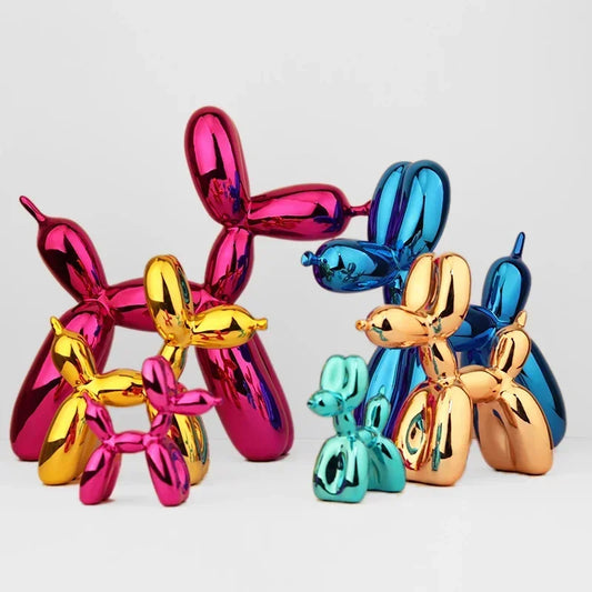 Colorful metallic dog sculptures on a light gray background