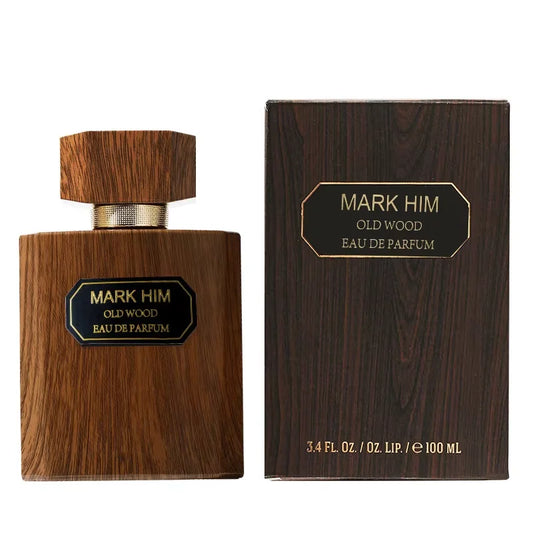 Wooden perfume bottle and packaging of Mark Him Old Wood Eau de Parfum on a white background