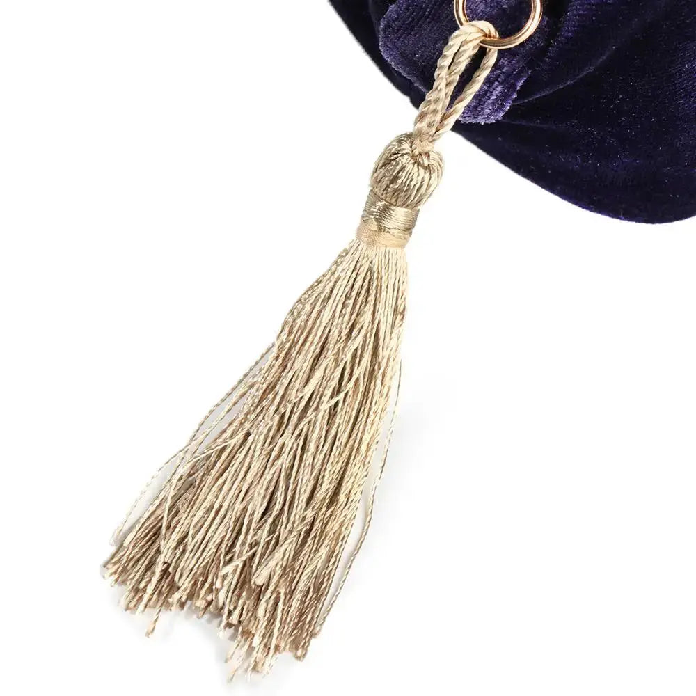 Gold tassel on a white background