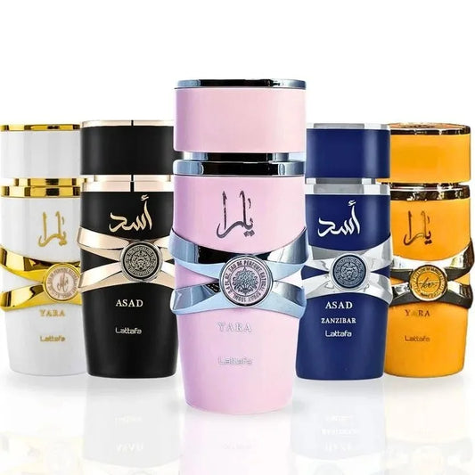 Collection of colorful perfume bottles with brand names on a white background