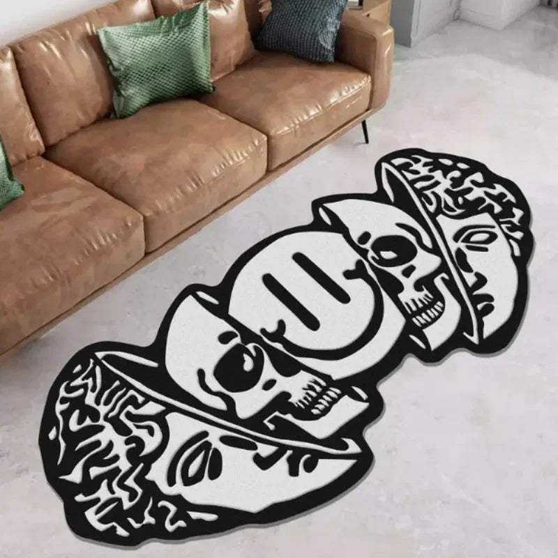 Decorative rug with skull design on a light-colored floor next to a brown leather sofa.