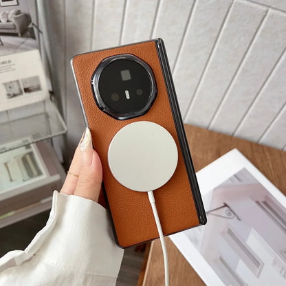 Phone case with a white circular design held by a hand, with a blurred indoor background.
