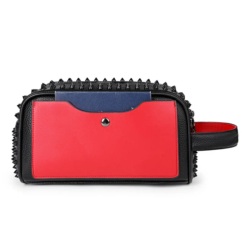 Red handbag with black studded details on a white background