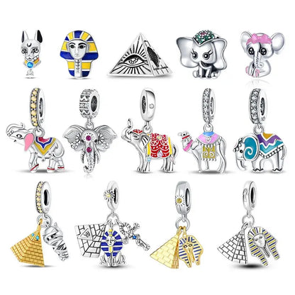Collection of various animal-themed charms on a white background