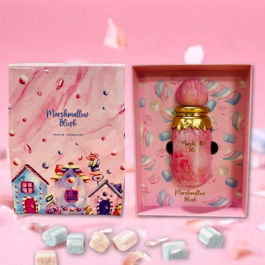Marshmallow Blush perfume bottle in a decorative box with candy-themed packaging on a pink background.