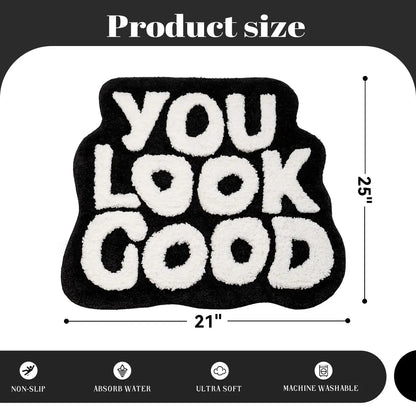 Textile product with 'YOU LOOK GOOD' text and measurements on a white background