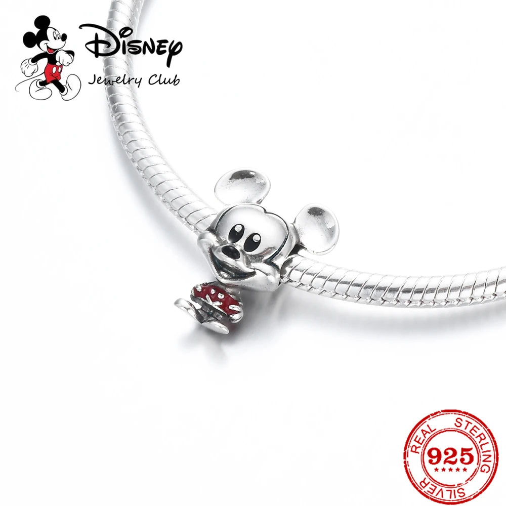 Silver bracelet with a Disney charm on a white background