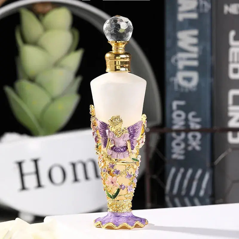 Decorative perfume bottle with gold and purple details on a blurred background