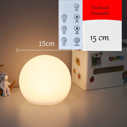 Round night light with control panel and measurement label on a surface