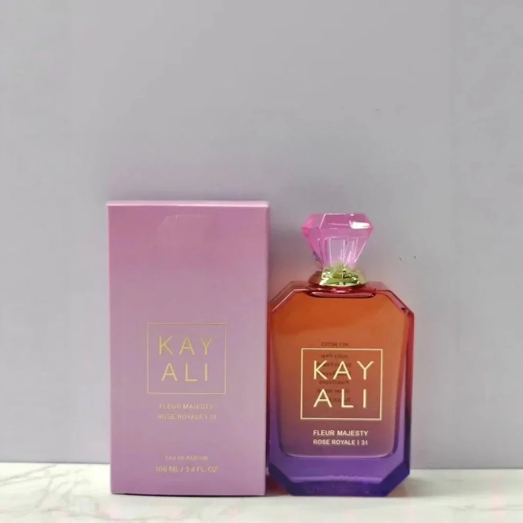 Kay Ali perfume bottle and packaging on a gray background
